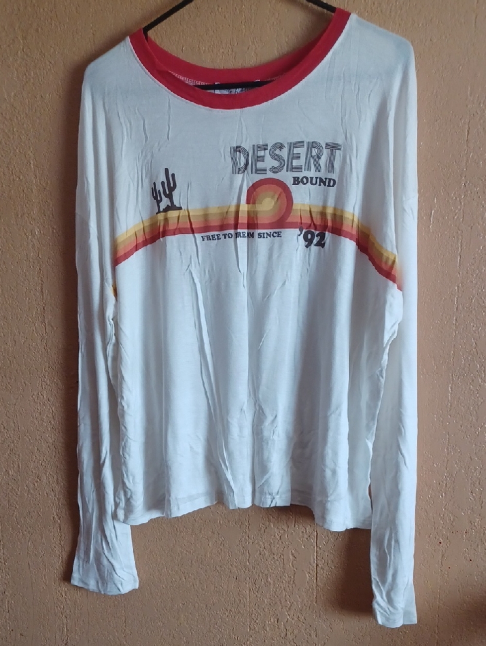 Pretty Rebellious White Long-Sleeve Tee with Red Trim and Sunset Graphic